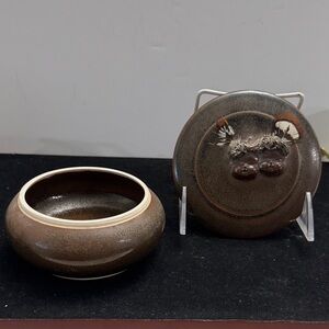 Artistic mixed-media ceramic art, Brown Ceramic Bowl with Lid of two children’s